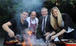 Callum McNicoll of Glengoyne Distillery, Chef Tom Lewis of Monachyle Mhor, Rural Affairs Secretary, Richard Lochhead and Stephanie Kennedy of Glengoyne Distillery barbeque some sausages made with 17 Years Old Glengoyne Whisky
