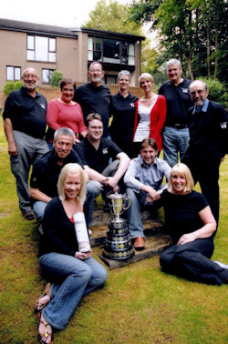 Alistair Walker (second right, front row) with members of Tryst and the prestigious Howard de Walden trophy