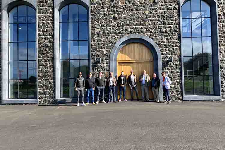 Photo of the new Bushmills Distillery, with everyone on the September tour.