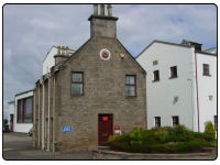 A photo of the Royal Brackla Distillery in Nairn within the Highlands of Scotland. 