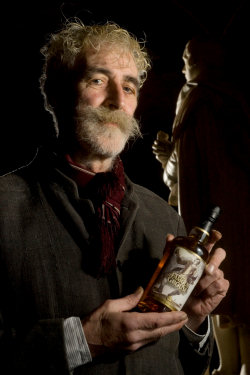 Artist John Byrne pictured with The Famous Grouse 37 year old blended malt whisky